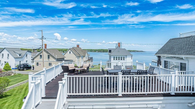 17 Bank Rd, York, ME 03909 - wooden terrace with an outdoor hangout area, outdoor dining space, a residential view, and a water view