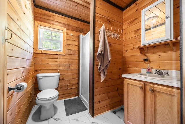 639 Main St, Springfield, ME 04487 - bathroom with wooden walls, vanity, toilet, marble look tiles, and a stall shower