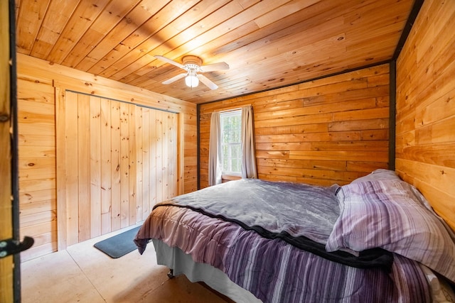 639 Main St, Springfield, ME 04487 - bedroom with wooden walls, wood ceiling, and ceiling fan