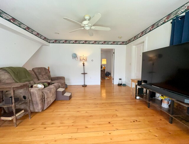 224 E Waterman Rd, Auburn, ME 04210 - living area with ceiling fan, light wood-style flooring, and baseboards