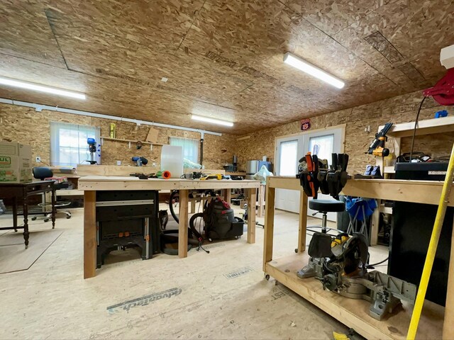 224 E Waterman Rd, Auburn, ME 04210 - below grade area featuring a workshop area and healthy amount of natural light