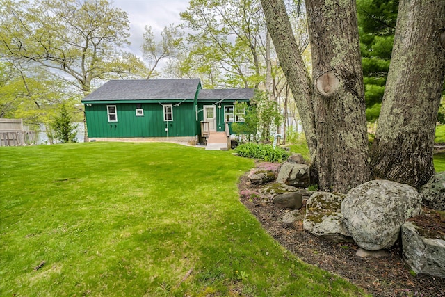 38 Cove Ln, Union, ME 04862 - view of front of home with board and batten siding and a shingled roof
