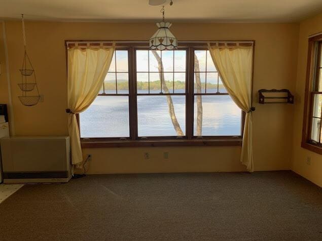 38 Cove Ln, Union, ME 04862 - unfurnished dining area featuring carpet
