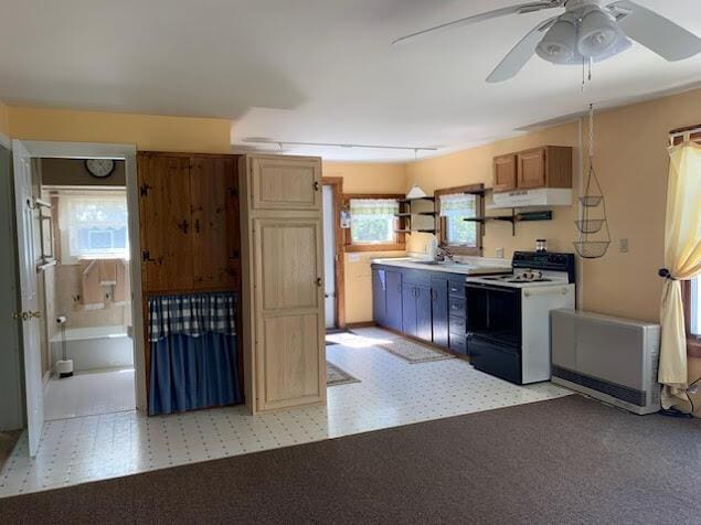 38 Cove Ln, Union, ME 04862 - kitchen featuring electric range oven, under cabinet range hood, plenty of natural light, and a ceiling fan