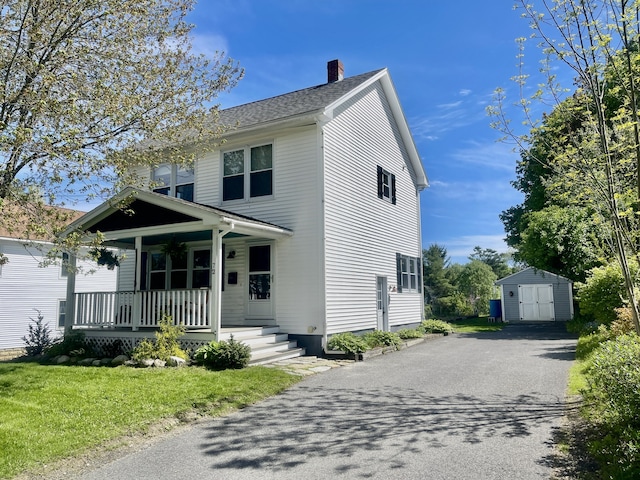 72 Winship St, Bath, ME 04530 - view of front of property with a porch, asphalt driveway, and a chimney