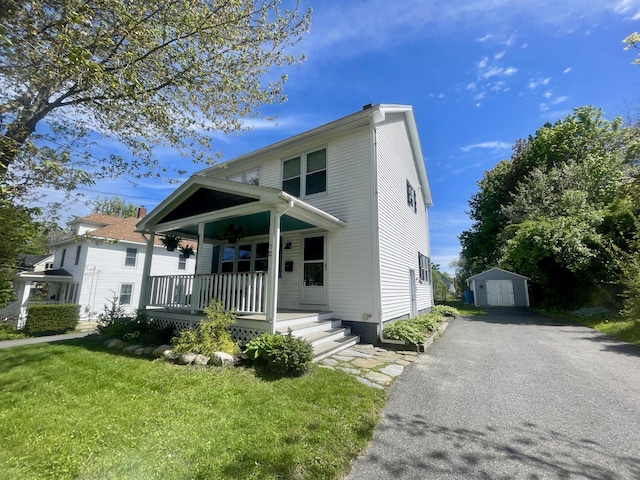 72 Winship St, Bath, ME 04530 - view of front of property with a porch, driveway, and a front lawn