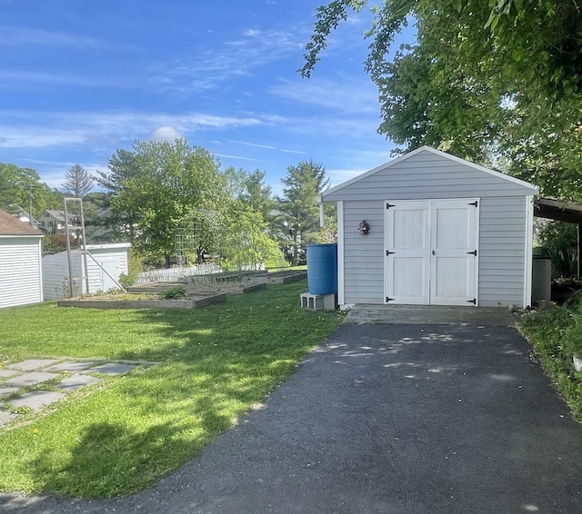 72 Winship St, Bath, ME 04530 - view of shed featuring a vegetable garden