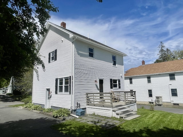72 Winship St, Bath, ME 04530 - back of property featuring a chimney, a wooden deck, and a yard