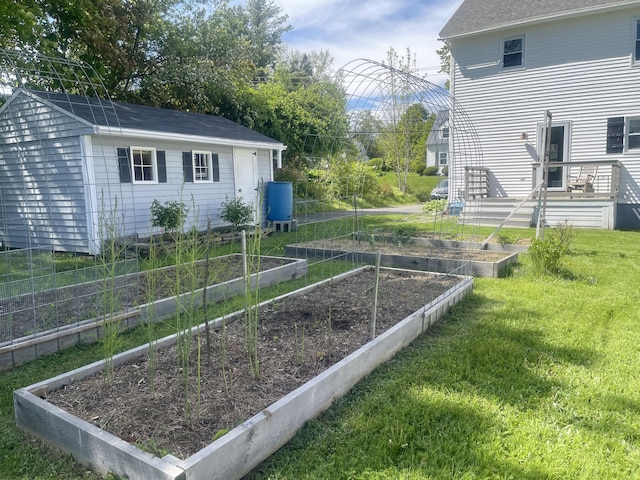 72 Winship St, Bath, ME 04530 - view of grassy yard featuring a garden and an outbuilding