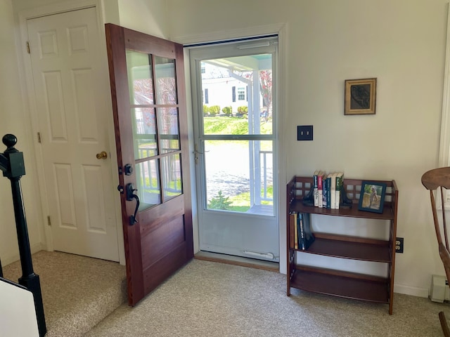 72 Winship St, Bath, ME 04530 - entryway featuring light colored carpet, healthy amount of natural light, and baseboards