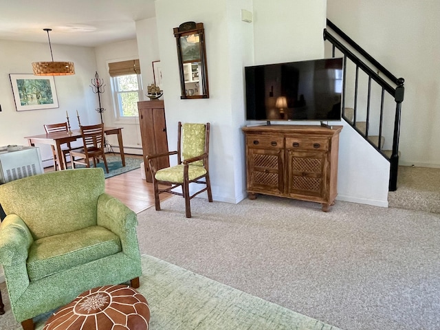 72 Winship St, Bath, ME 04530 - living area with carpet, stairway, a baseboard heating unit, and baseboards