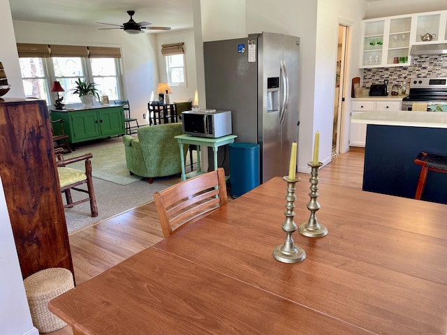 72 Winship St, Bath, ME 04530 - dining area with ceiling fan and light wood-style floors