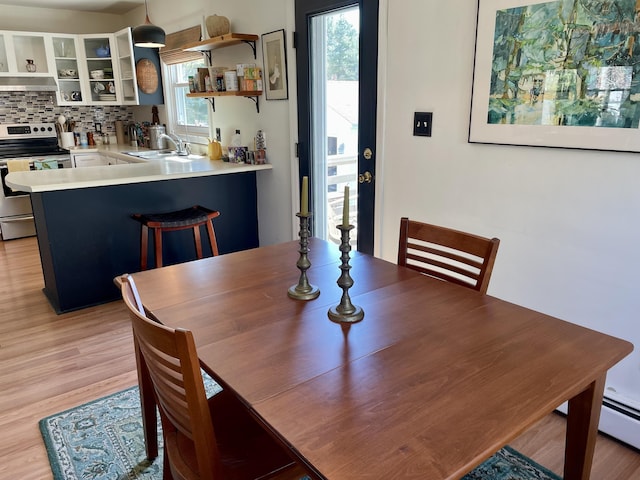 72 Winship St, Bath, ME 04530 - dining room with healthy amount of natural light and light wood-style floors