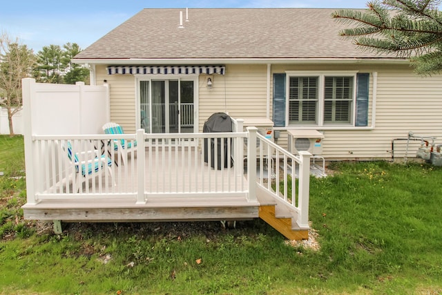 9 Camden Ct Unit 9, Bangor, ME 04401 - back of house with a shingled roof, a yard, and a wooden deck