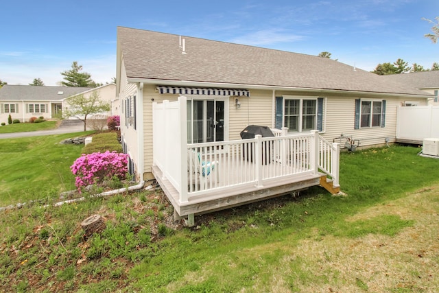 9 Camden Ct Unit 9, Bangor, ME 04401 - rear view of property with a yard, a shingled roof, and a deck