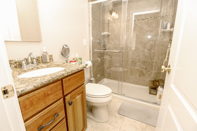 9 Camden Ct Unit 9, Bangor, ME 04401 - full bath with tile patterned floors, a shower stall, toilet, and vanity