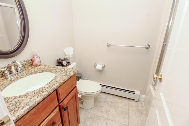 9 Camden Ct Unit 9, Bangor, ME 04401 - bathroom featuring a baseboard radiator, tile patterned floors, vanity, and toilet