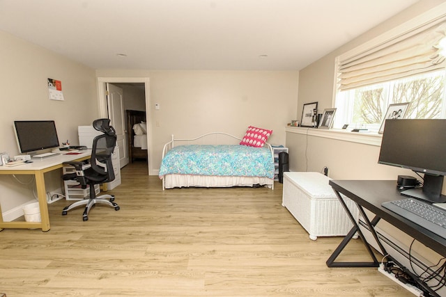 9 Camden Ct Unit 9, Bangor, ME 04401 - bedroom featuring a desk, light wood-style flooring, and baseboards
