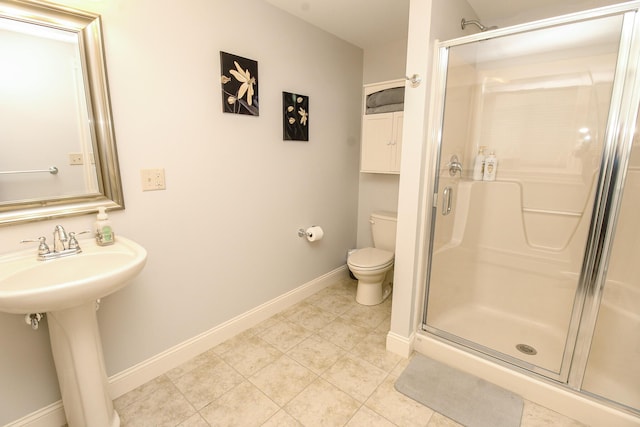 9 Camden Ct Unit 9, Bangor, ME 04401 - full bathroom featuring baseboards, a stall shower, toilet, and tile patterned floors