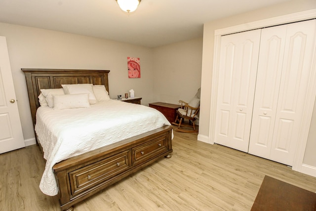 9 Camden Ct Unit 9, Bangor, ME 04401 - bedroom with a closet, light wood-style floors, and baseboards