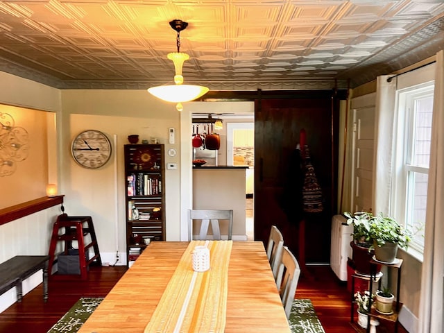 90 N Ave, Skowhegan, ME 04976 - dining space with an ornate ceiling and dark wood-style floors