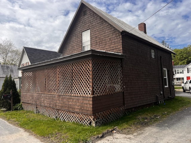 90 N Ave, Skowhegan, ME 04976 - view of property exterior featuring a chimney
