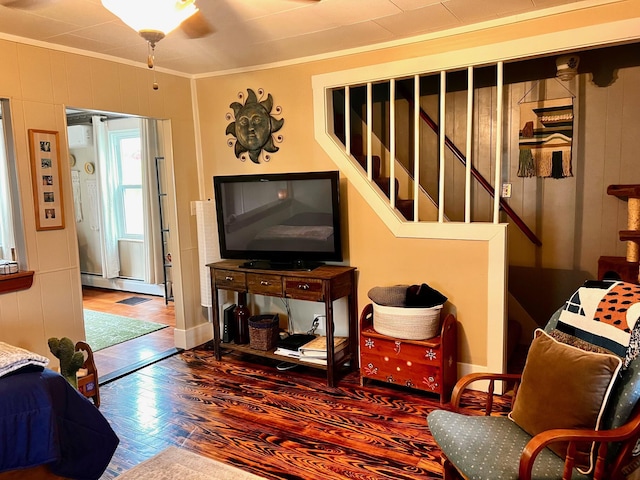 90 N Ave, Skowhegan, ME 04976 - living room with wood finished floors, crown molding, stairs, and a baseboard heating unit