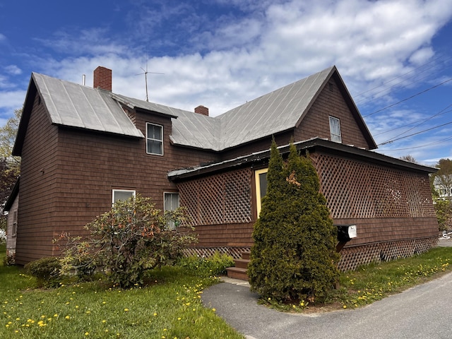 90 N Ave, Skowhegan, ME 04976 - view of side of home with a chimney