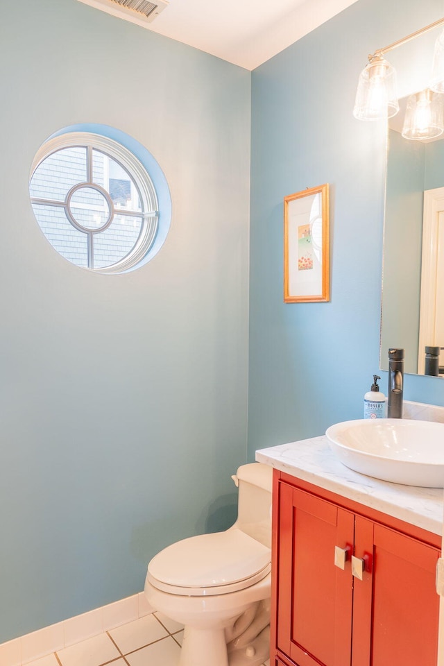 311 Chandlers Wharf Unit 311, Portland, ME 04101 - bathroom featuring vanity, tile patterned floors, and toilet