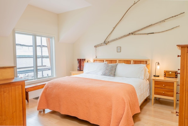 311 Chandlers Wharf Unit 311, Portland, ME 04101 - bedroom featuring light wood-type flooring and a water view