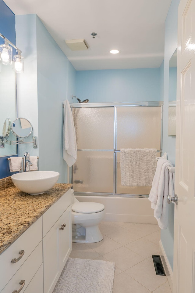 311 Chandlers Wharf Unit 311, Portland, ME 04101 - bathroom featuring vanity, toilet, shower / bath combination with glass door, tile patterned floors, and recessed lighting