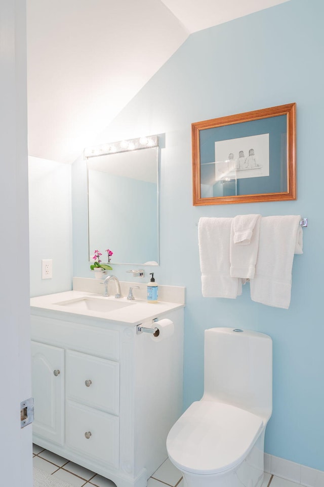 311 Chandlers Wharf Unit 311, Portland, ME 04101 - half bath with vaulted ceiling, vanity, toilet, and tile patterned floors