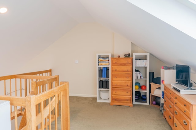 311 Chandlers Wharf Unit 311, Portland, ME 04101 - bedroom featuring lofted ceiling and light carpet