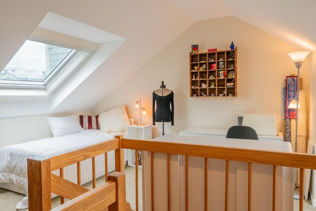 311 Chandlers Wharf Unit 311, Portland, ME 04101 - bedroom with vaulted ceiling, a skylight, and carpet