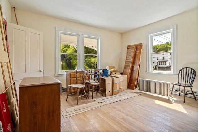 31 Bath St, Bath, ME 04530 - office area featuring radiator heating unit, wood finished floors, and plenty of natural light