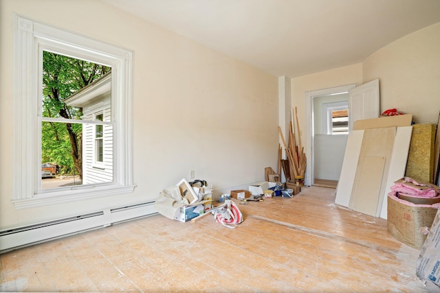 31 Bath St, Bath, ME 04530 - spare room with a baseboard radiator, plenty of natural light, and wood finished floors