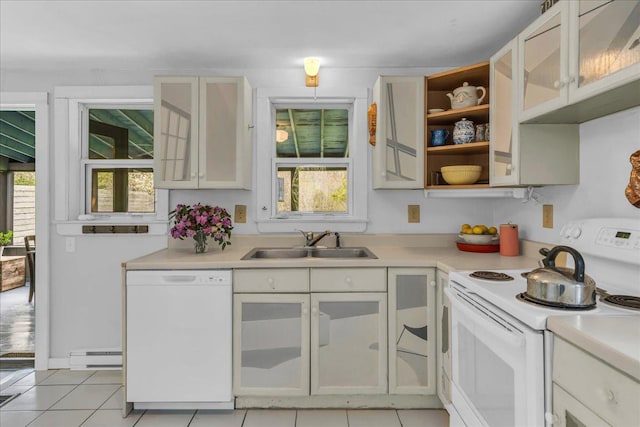637 Falls Bridge Rd, Blue Hill, ME 04614 - kitchen featuring white appliances, a sink, a baseboard heating unit, and light countertops