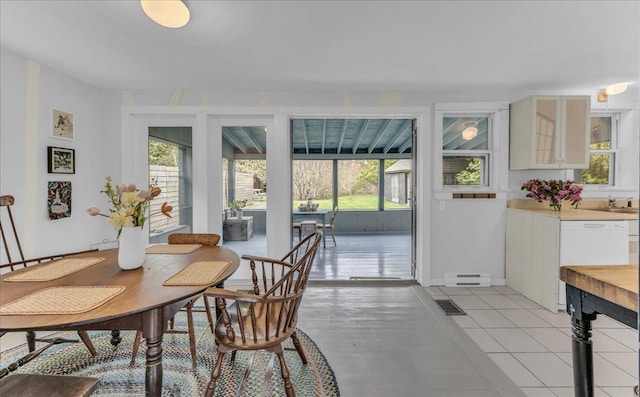 637 Falls Bridge Rd, Blue Hill, ME 04614 - dining room featuring plenty of natural light, a baseboard radiator, and baseboards