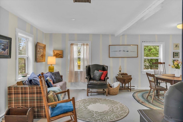 637 Falls Bridge Rd, Blue Hill, ME 04614 - living area with a baseboard radiator, wallpapered walls, and beamed ceiling