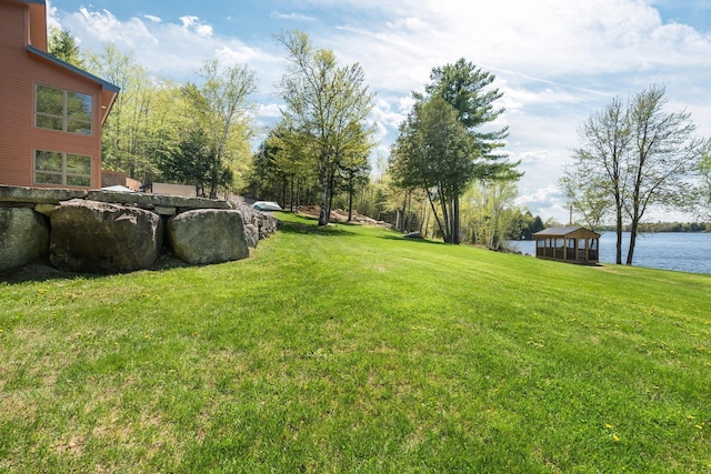 36 Sunset Dr, Saint Albans, ME 04971 - view of green lawn featuring a water view