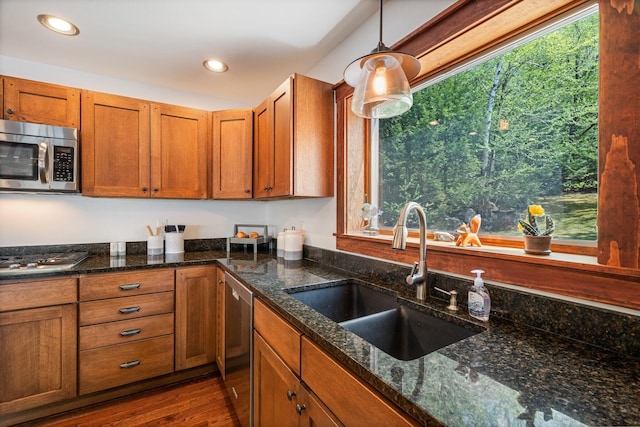 36 Sunset Dr, Saint Albans, ME 04971 - kitchen with appliances with stainless steel finishes, a sink, brown cabinets, decorative light fixtures, and recessed lighting