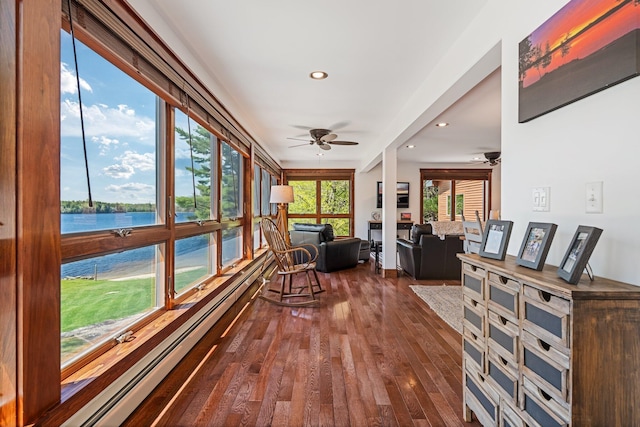 36 Sunset Dr, Saint Albans, ME 04971 - sunroom / solarium featuring a water view, hardwood / wood-style flooring, baseboard heating, and recessed lighting