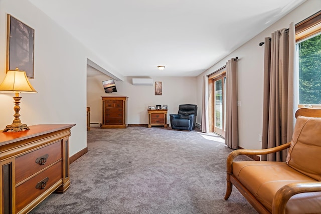 36 Sunset Dr, Saint Albans, ME 04971 - sitting room featuring a wall mounted AC, carpet, a baseboard heating unit, and baseboards