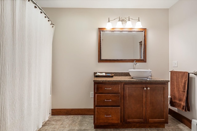 36 Sunset Dr, Saint Albans, ME 04971 - full bath with baseboards, vanity, baseboard heating, and a shower with shower curtain