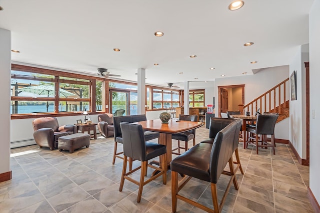 36 Sunset Dr, Saint Albans, ME 04971 - dining space with a ceiling fan, a baseboard radiator, baseboards, recessed lighting, and stairs
