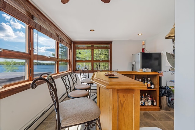 36 Sunset Dr, Saint Albans, ME 04971 - indoor dry bar featuring a water view, tile patterned floors, ceiling fan, and recessed lighting