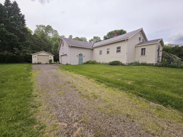 1132 College Ave, Old Town, ME 04468 - view of front of home with a front lawn and a chimney