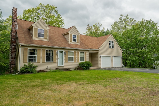 17 Easy St, Standish, ME 04084 - cape cod-style house featuring a chimney, asphalt driveway, a front yard, and a garage