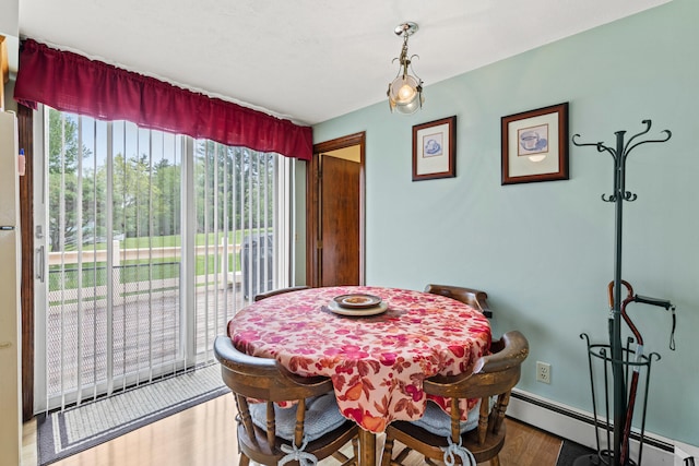 4 Shirley Ln, Gorham, ME 04038 - dining room featuring baseboard heating and wood finished floors