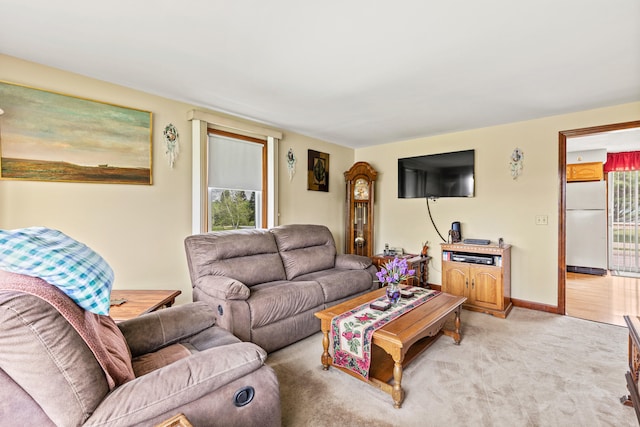 4 Shirley Ln, Gorham, ME 04038 - living room featuring light carpet and baseboards